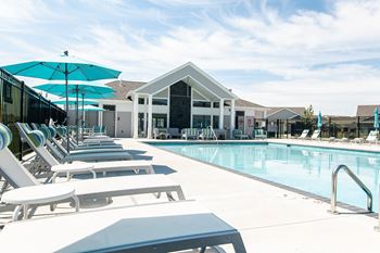 Pool With Lounge Chairs at Centennial Crossing, Waukee, 50263